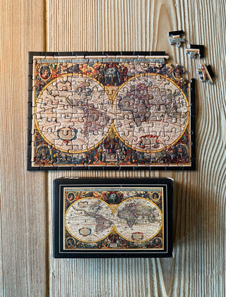 Das Vintage-Mini-Puzzle „New World“ mit 99 Teilen von Penny Puzzle
