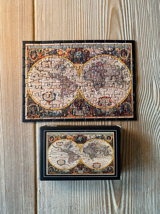 Das Vintage-Mini-Puzzle „New World“ mit 99 Teilen von Penny Puzzle