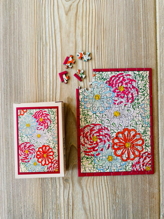 Flower Wheels Mini-Puzzle mit 99 Teilen von Penny Puzzle
